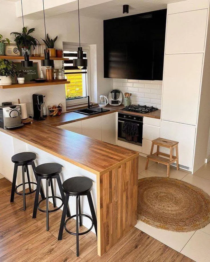 Kitchen with multi-level wood bar.