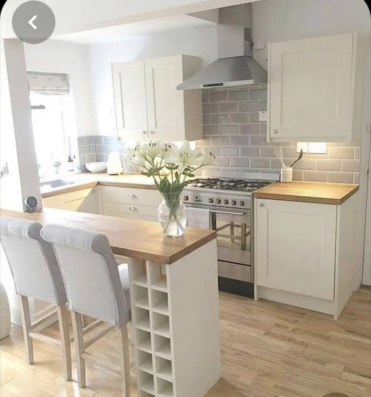 Wood kitchen bar with integrated wine rack.