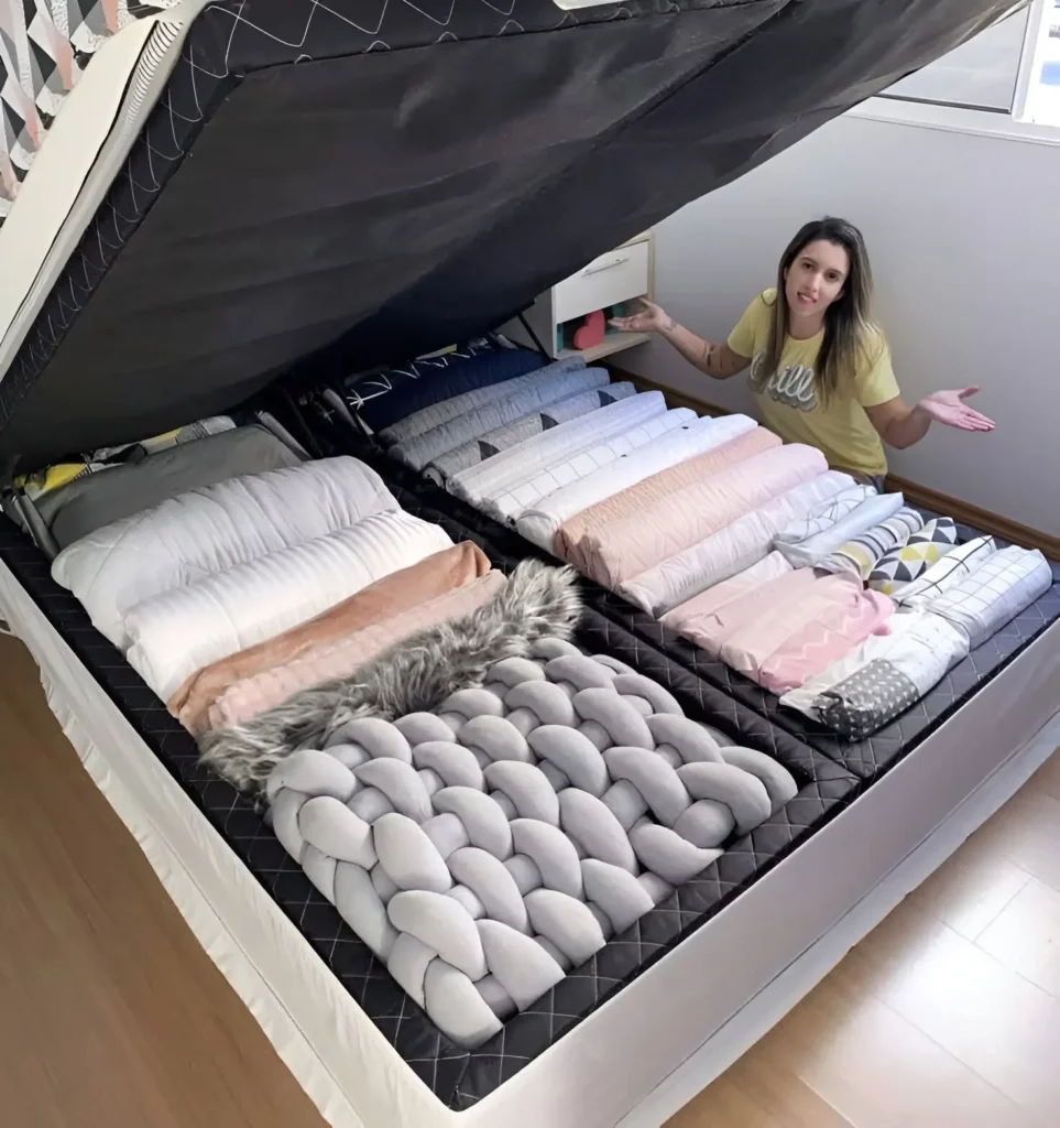 Lift-up bed frame revealing under-bed storage.