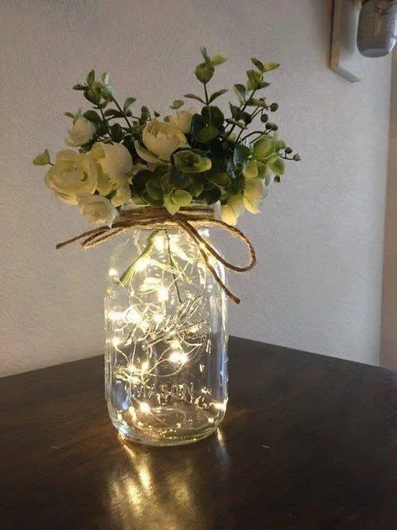 DIY Mason Jar with Fairy Lights and Flowers Decoration.