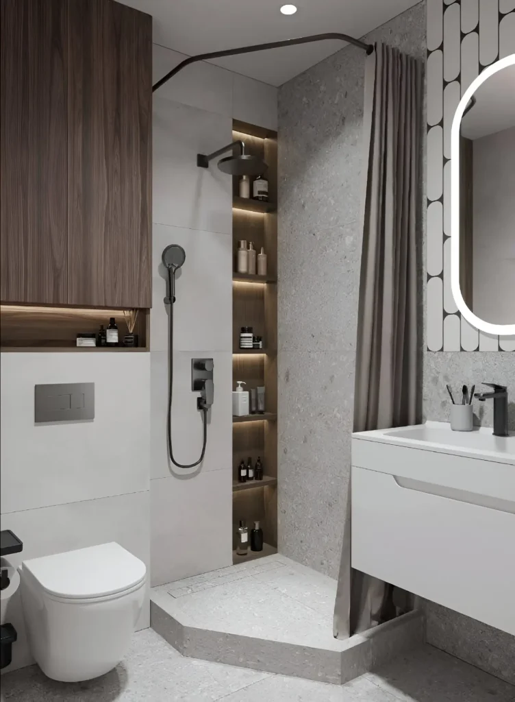 Modern small bathroom with corner shower, built-in shower niches, dark gray accent wall, and white vanity.