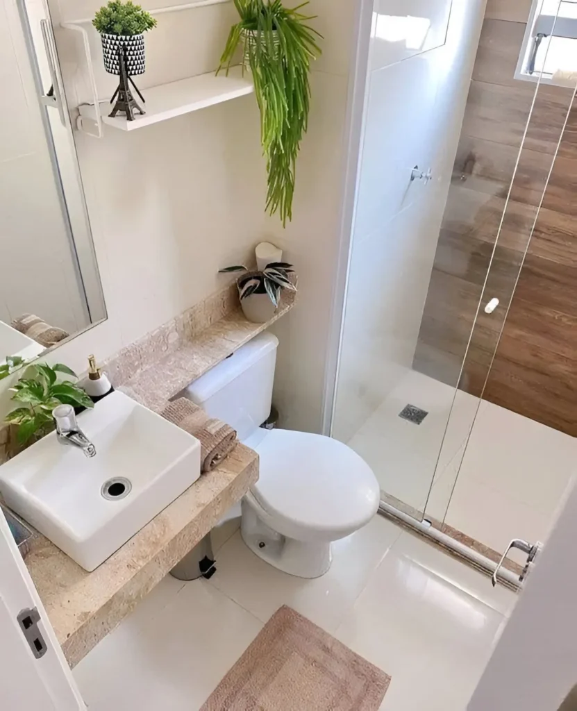 Modern small bathroom with plants on shelves, a light-colored countertop, and a walk-in shower.