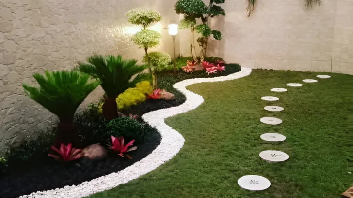 Garden decor with a winding pathway made of stepping stones, bordered by white pebbles and plants.