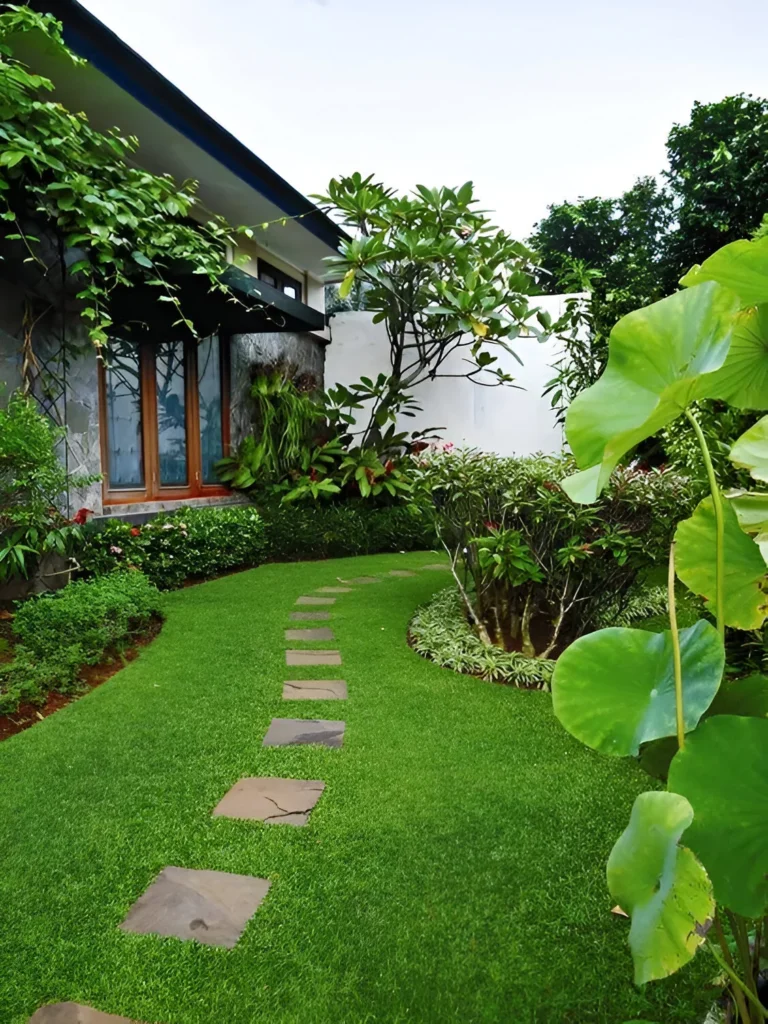 Garden decor with a naturalistic pathway of irregularly shaped stepping stones and lush greenery.