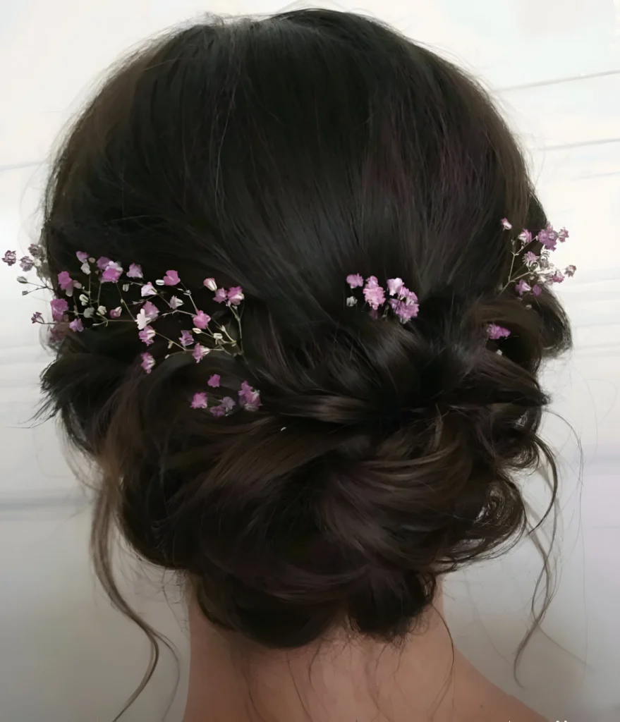 Upcycled Christmas hairstyles low bun with flowers